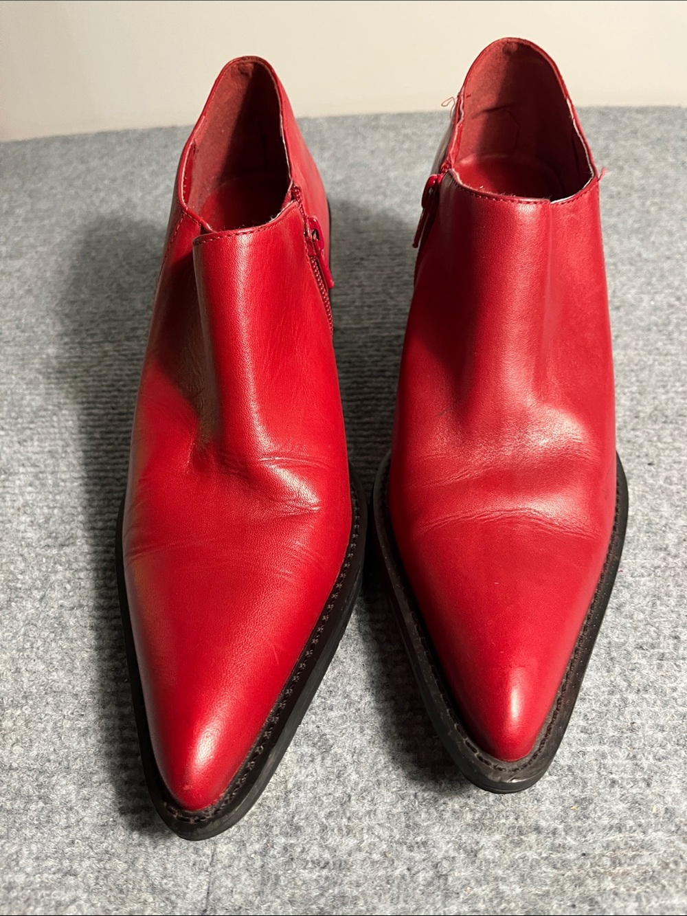 Women's Red Pointed Ankle Booties - Sleek Side-Zip Style. Minor signs of wear.